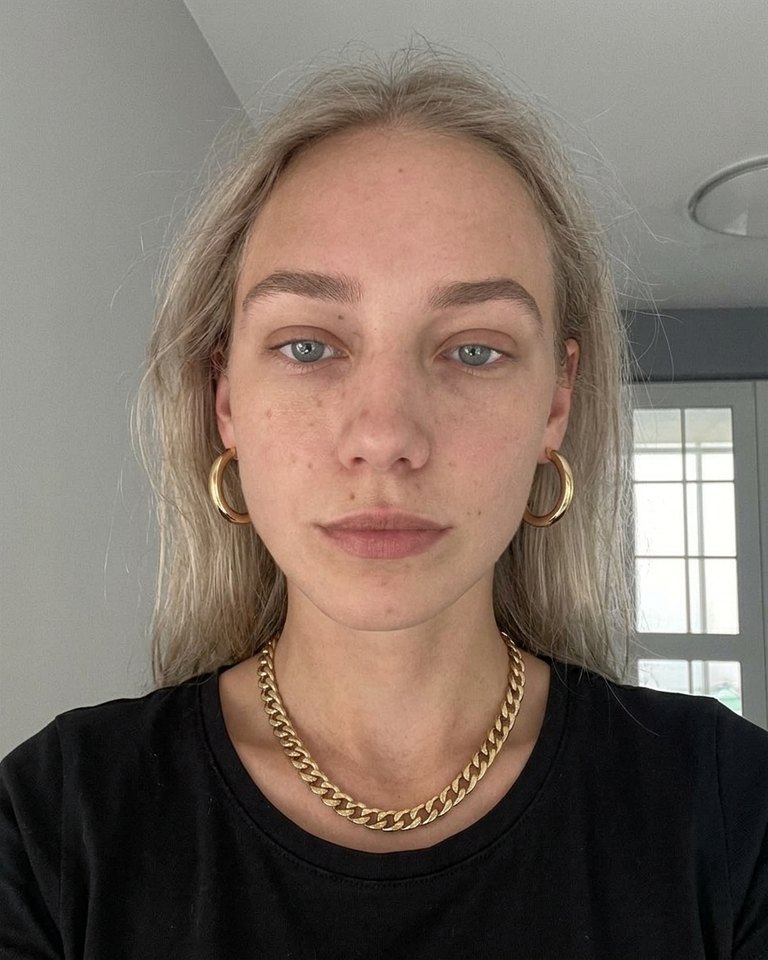 Gold · Cool-soft (summer): silver reads clean; gold warms her too much.