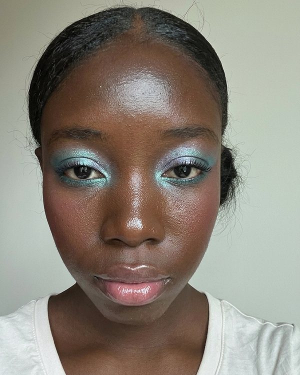 Mermaidcore shimmer on an AI sample face